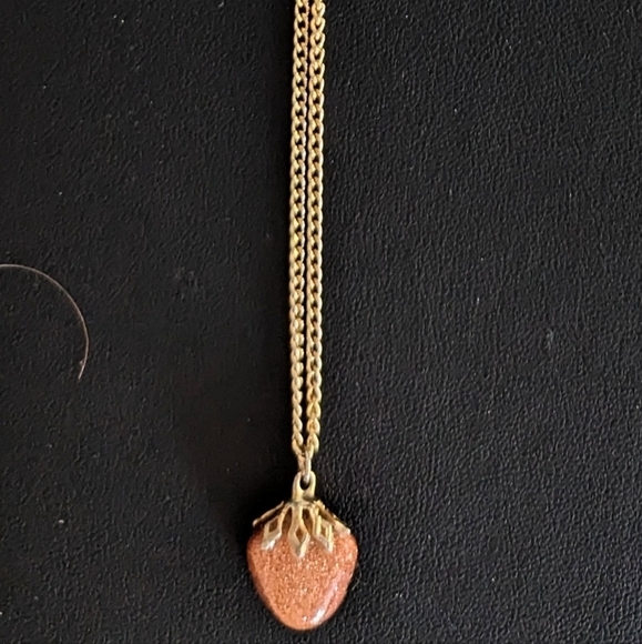 Jewelry - A Sunstone pendant on a Gold toned chain 19” inches.